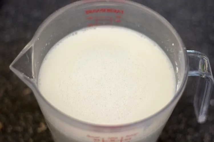 Cornstarch and soy milk mixture in measuring cup