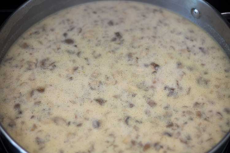 Vegan Cream of Mushroom Soup reducing in pan