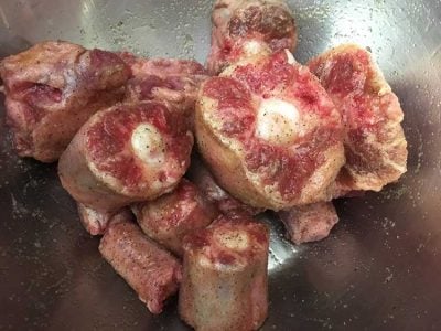 Pressure Cooker Oxtail Stew - uncooked oxtails after seasoned | The Foodie Eats