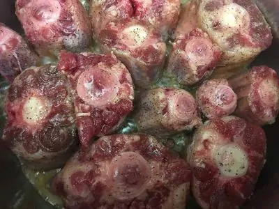 Pressure Cooker Oxtail Stew - browning oxtails in Instant Pot | The Foodie Eats