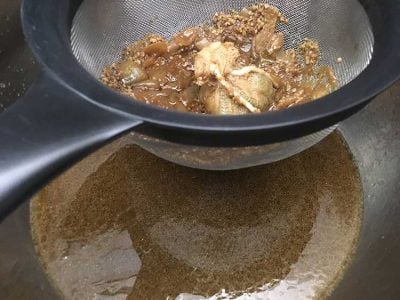 Pressure Cooker Oxtail Stew - pass sauce through fine mesh strainer | The Foodie Eats