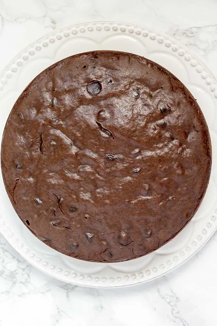 Instant pot brownies, pictured from above, on a white plate.