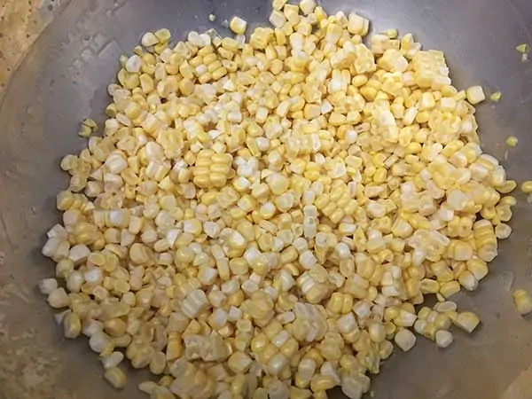 Corn kernels in mixing bowl.