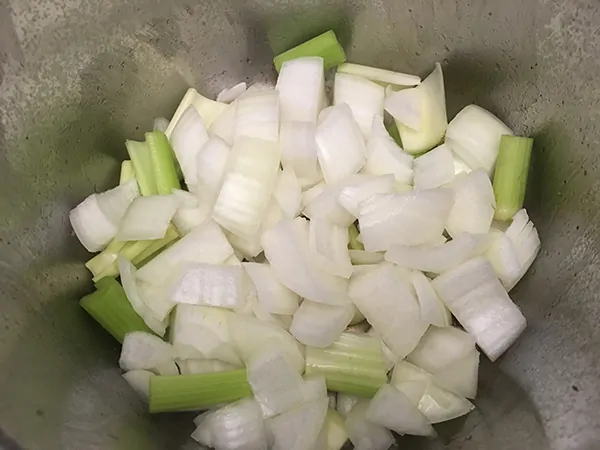 Chopped onions and celery in Instant Pot
