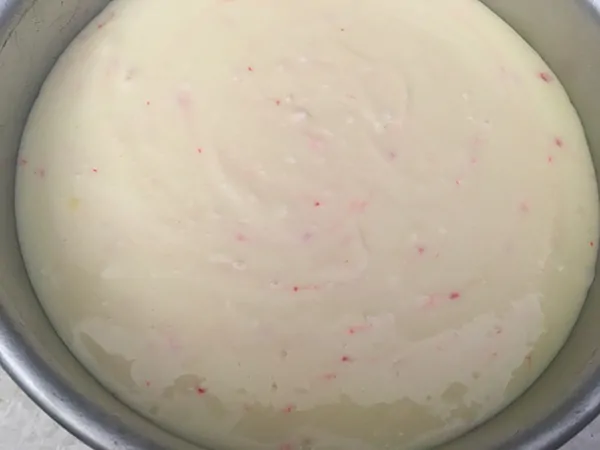 Peppermint cheesecake batter in pan.