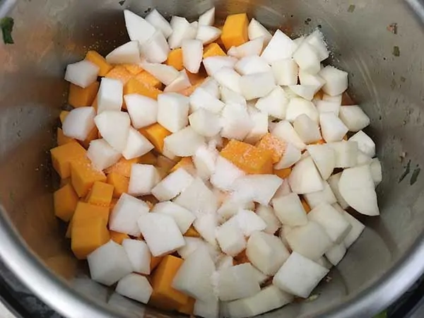 chopped turnip roots and butternut squash in Instant Pot