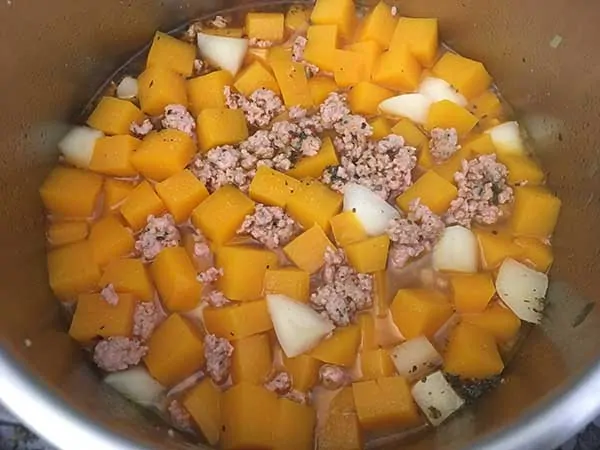 butternut squash, turnip roots, and Italian sausage in chicken broth