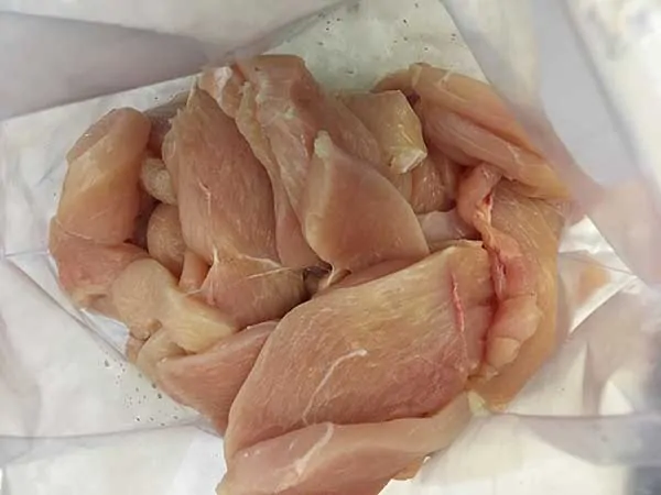 thinly sliced chicken in Ziplock back
