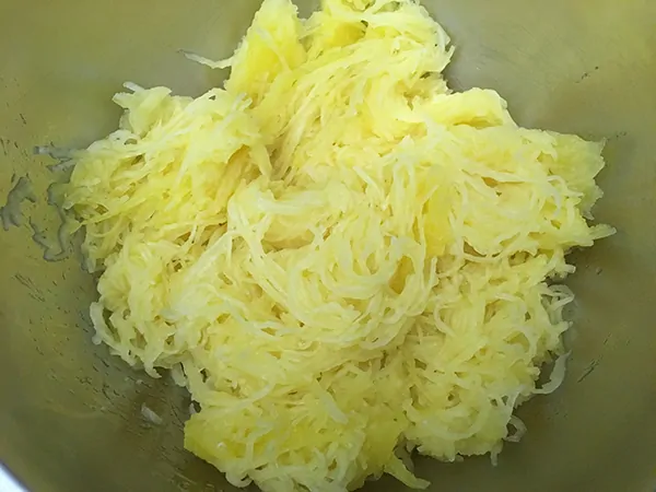 spaghetti squash in mixing bowl