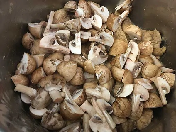 Quartered baby bella mushrooms.