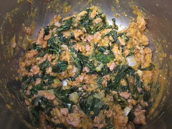 browned Italian sausage with sweet potatoes and spinach in Instant Pot