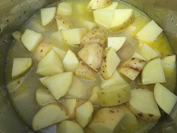 chopped gold potatoes in vegetable broth