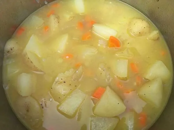 cooked potatoes in vegetable broth