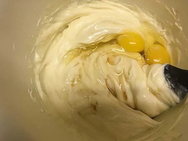 cream cheese mixture topped with two eggs