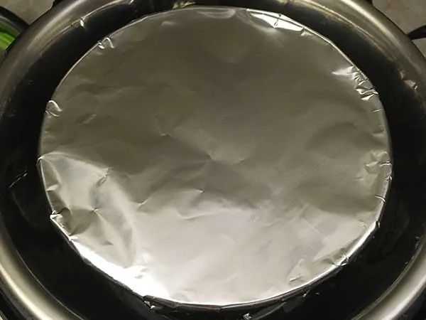 pan covered with aluminum foil inside Instant Pot