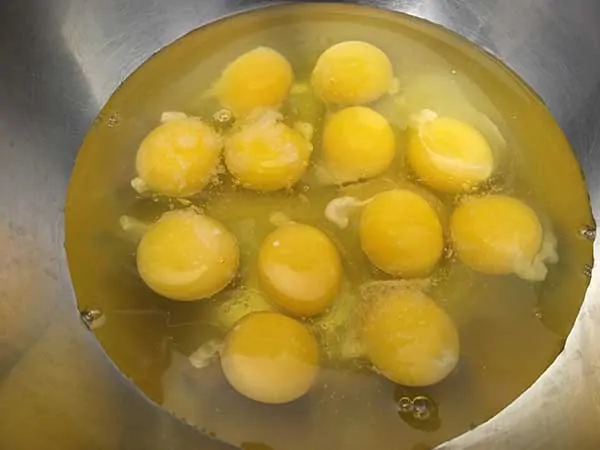 one dozen raw eggs topped with sea salt