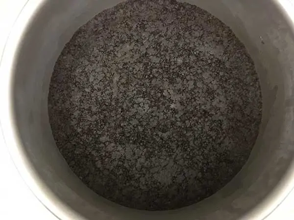 slightly frozen Oreo crust in pan.