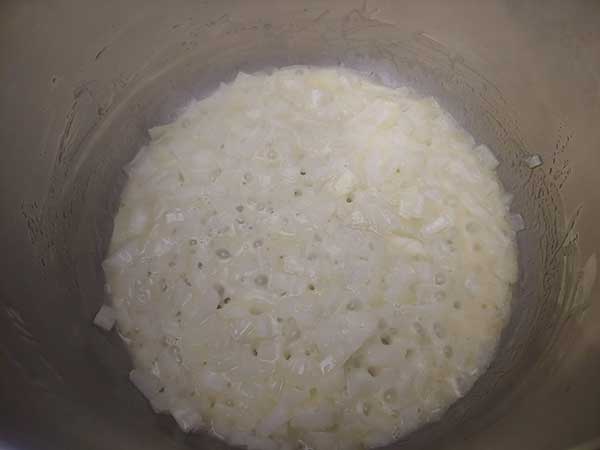 Diced onions sautéing in butter.