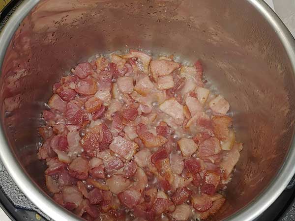 Bacon cooking in Instant Pot.