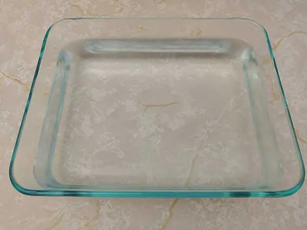 Water in Pyrex dish.