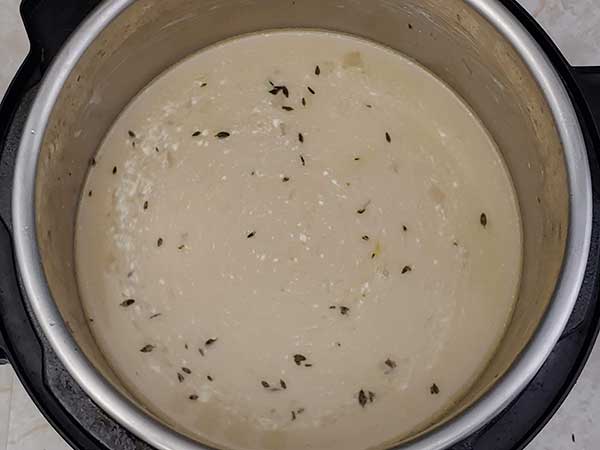 Chicken stock with melted cream cheese.