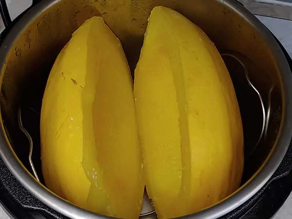Cooked spaghetti squash halves in Instant Pot.