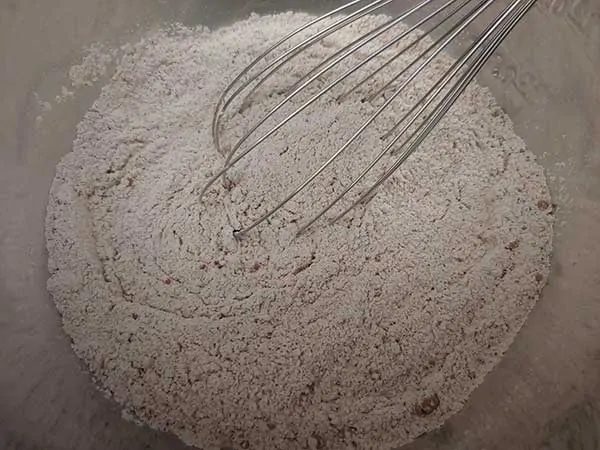 Dry ingredients in mixing bowl with whisk.