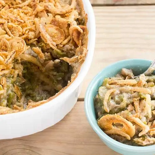Vegan green bean casserole in dish and small bowl.