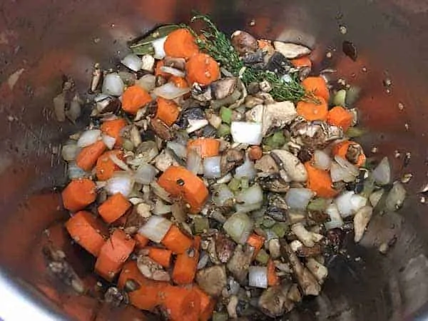 Vegetables sautéing in pot