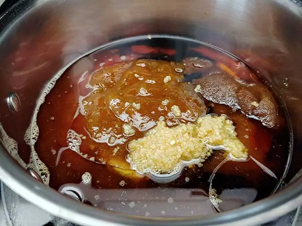 Barbecue sauce ingredients in small pot.