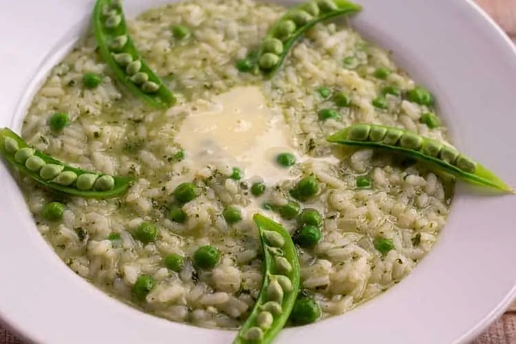 Instant Pot Pea and Mint Risotto in white bowl.