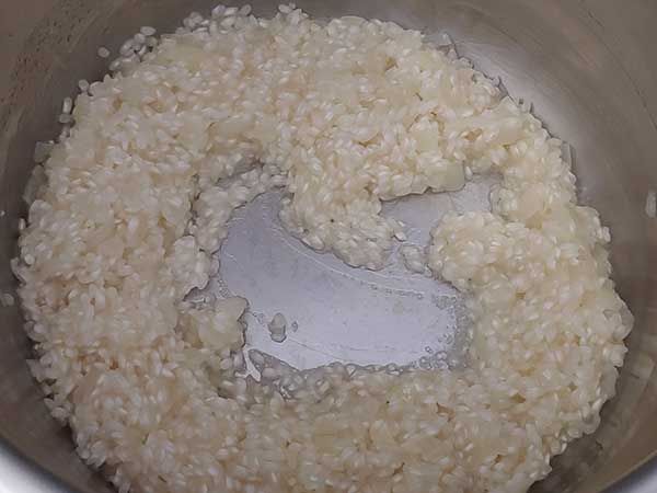 Partially cooked rice in Instant Pot.