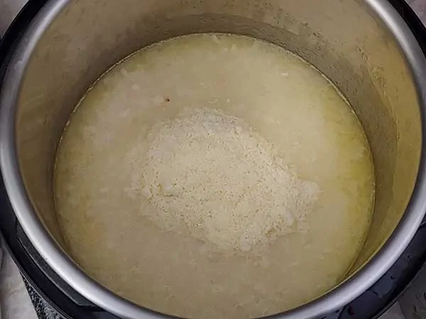 Cooked rice in chicken broth topped with Parmesan cheese.