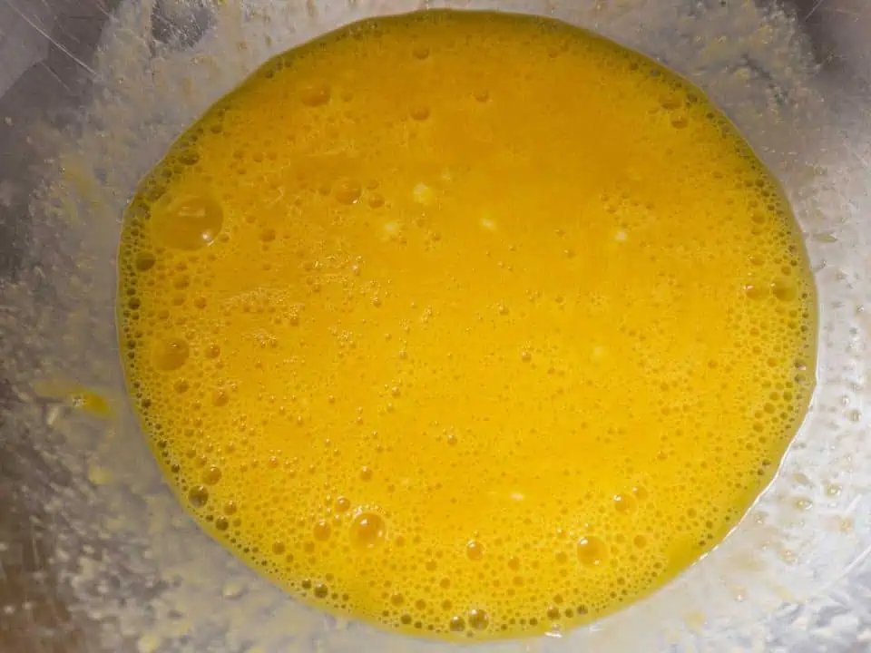 beaten eggs in large mixing bowl.