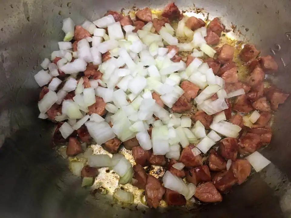 Diced sausage and onions in Instant Pot.
