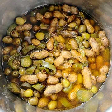 Cooked boiled peanuts with pickles, jalapenos, and olives in Instant Pot.