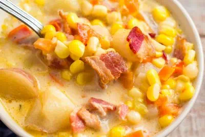 Instant Pot corn chowder closeup in white bowl.