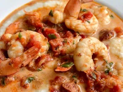 Closeup of Instant Pot shrimp and grits in white bowl.