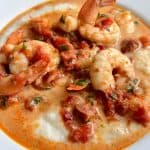 Instant Pot shrimp and grits in large-rimmed white bowl.