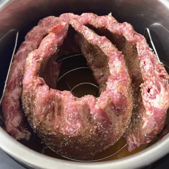 Two racks of ribs in an Instant Pot.