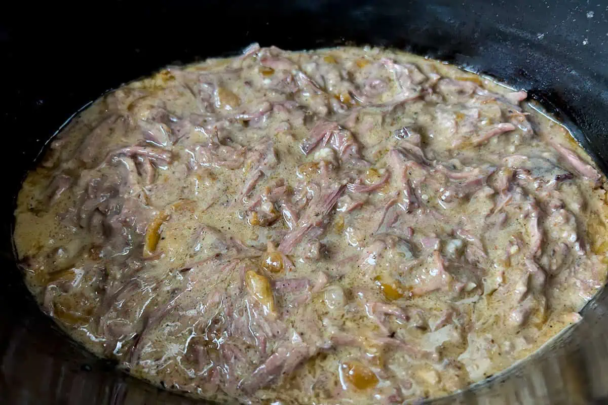 Tender shredded chuck roast coated in cream of mushroom gravy