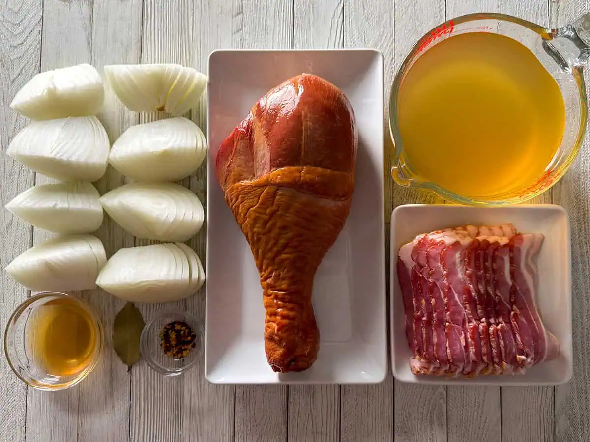 Onions, smoked turkey, bacon, broth, vinegar, bay leaf, and red pepper flakes for collard greens pot liquor