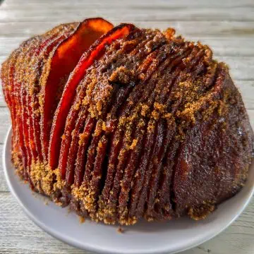 Spiral-cut ham with a dark brown sugar spice crust after warming in the Instant Pot and finishing under the broiler.