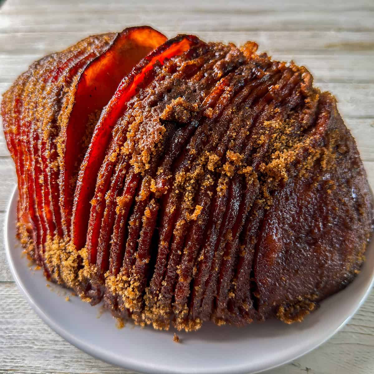 Spiral-cut ham with a dark brown sugar spice crust after warming in the Instant Pot and finishing under the broiler.