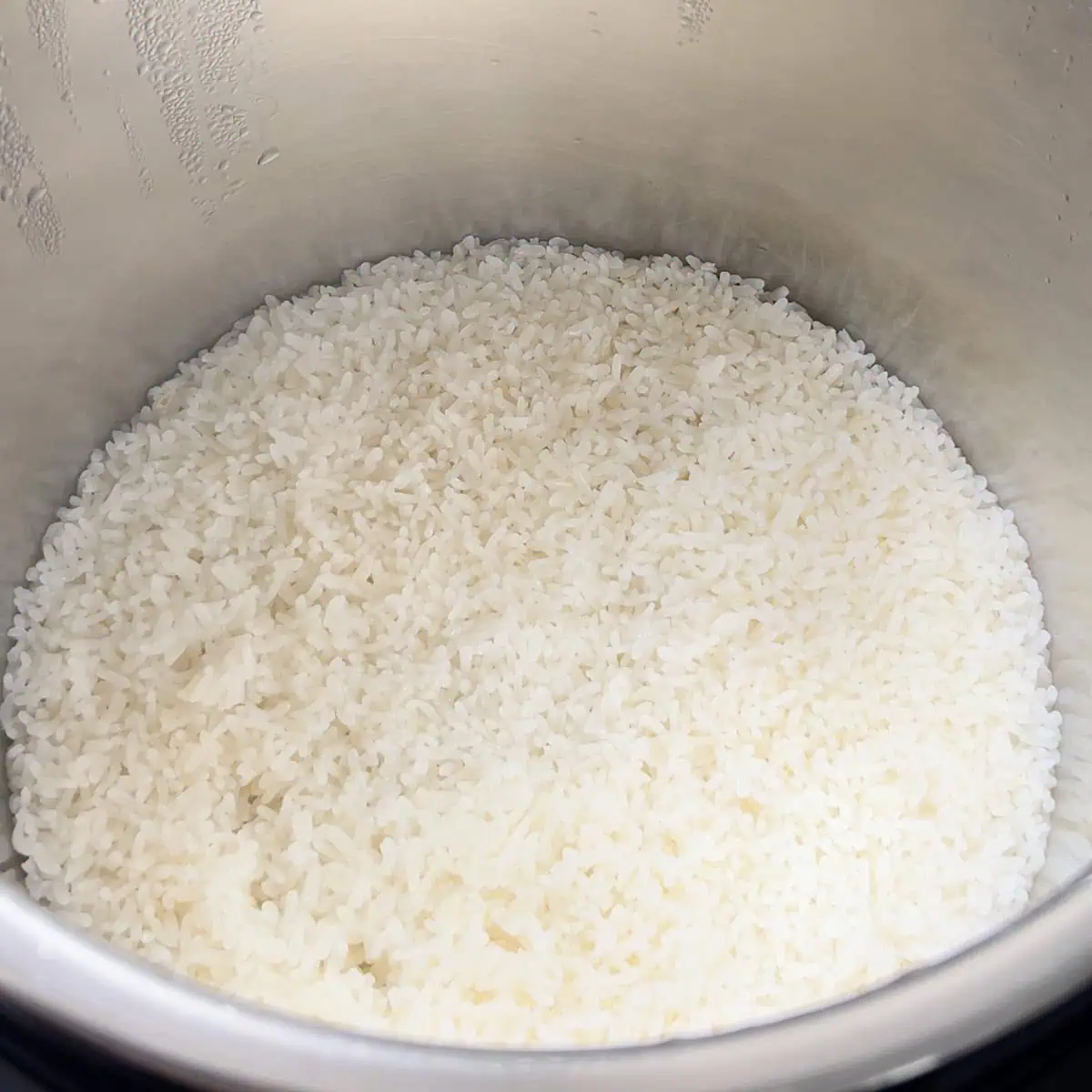 Cooked short grain sushi rice inside the Instant Pot after low pressure cooking