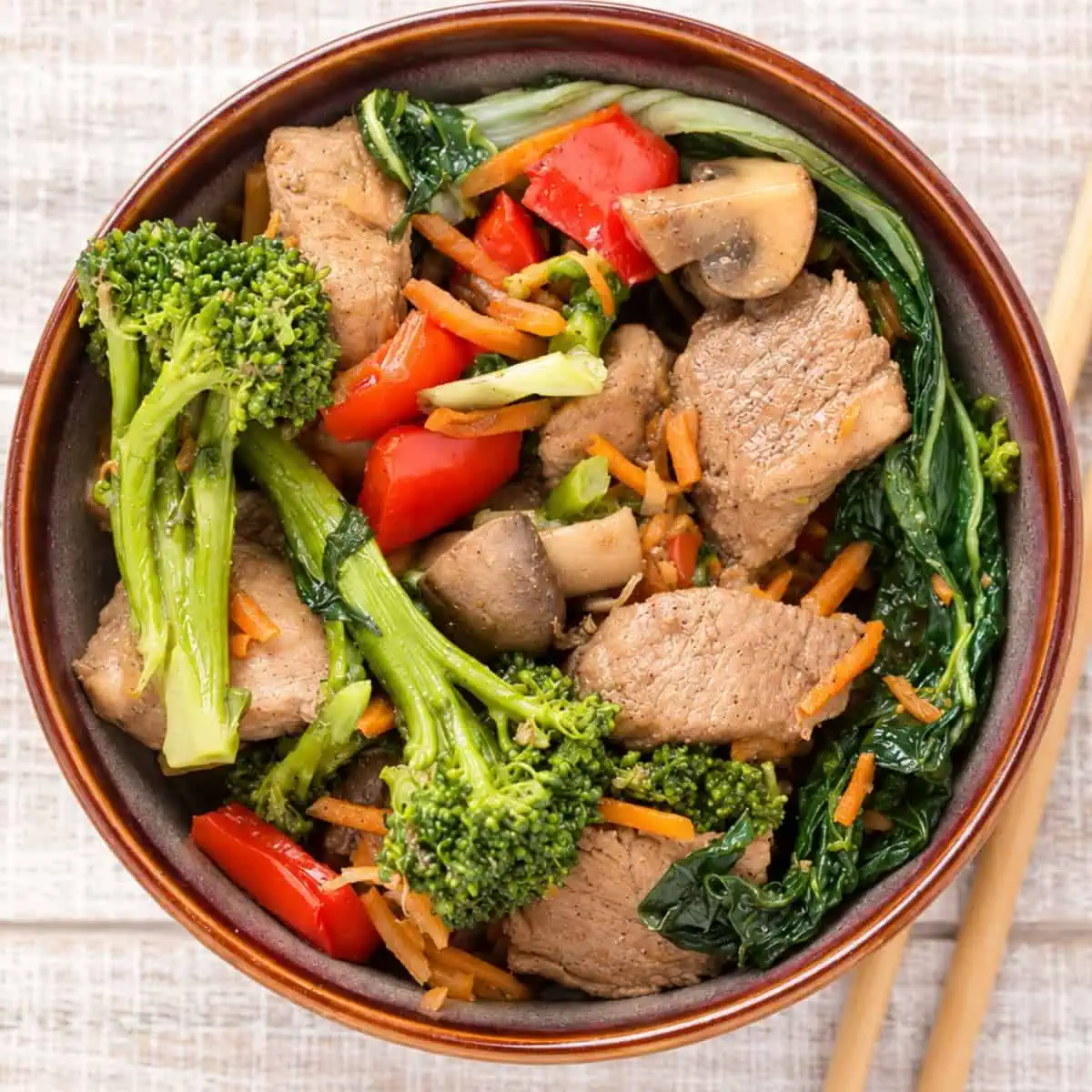 Instant Pot chicken stir fry with colorful vegetables served in a bowl